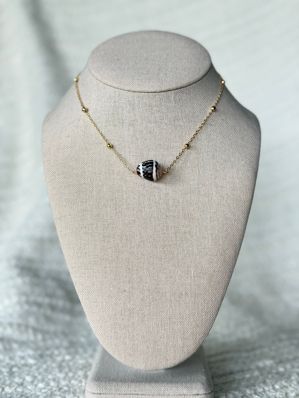 Cone shell necklace