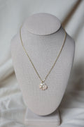 Seashell cross necklace